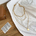 Gold and silver plated necklace – Grey