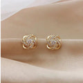 Cross earrings in flower spiral – image 4