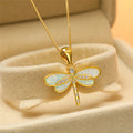 Necked with a gold colored dragonfly with opal – image 4