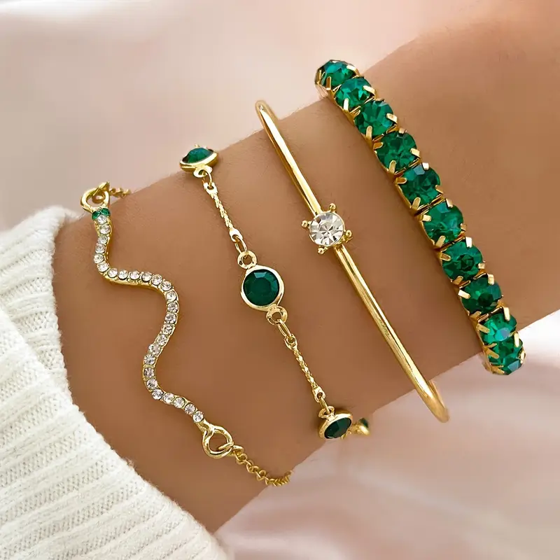 Set of vintage bracelets with green zirconia