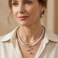Set consisting of necklace and earrings made of natural pearls – image 2