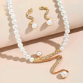Set consisting of necklace and earrings made of natural pearls – image 4