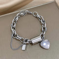 Thick heart bracelet in gold – White Gold