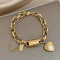Thick heart bracelet in gold – Gold