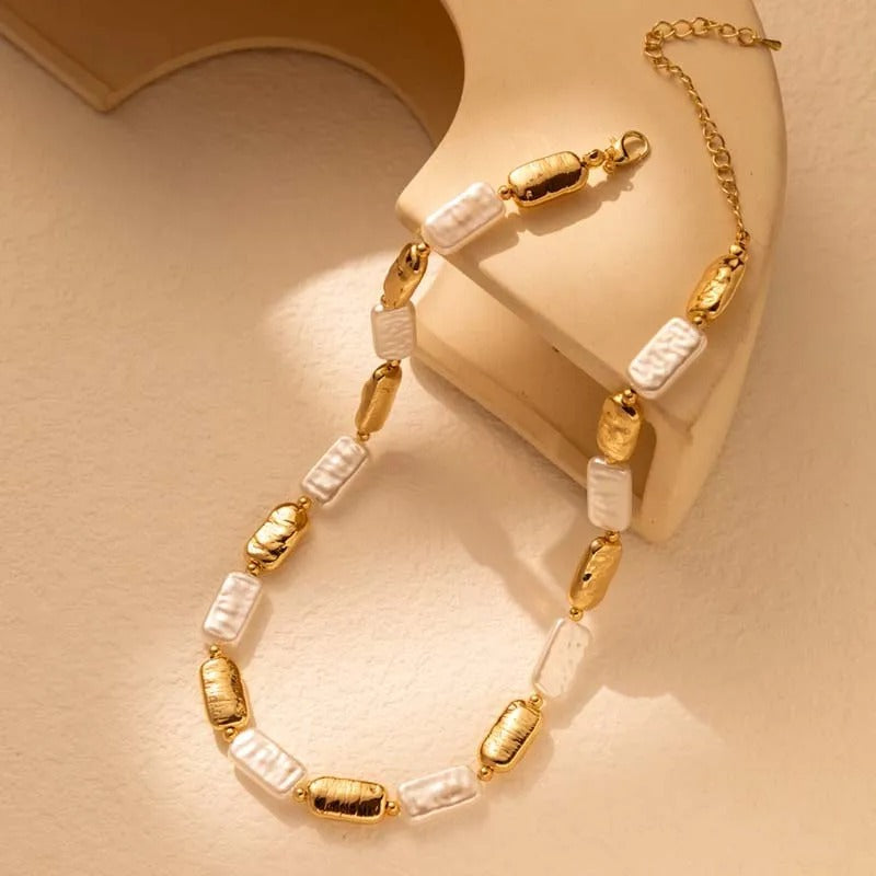 Vintage necklace with rectangular gold and white pearls